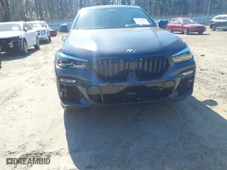 2021 BMW X6 M50i with VIN 5UXCY8C07M9E32426, listed as a IAAI auction lot 41715641 with 23,000 mi miles. Bid and sale history available at carsss.com. Image 6.