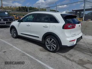 2017 Kia Niro Touring with VIN KNDCE3LC3H5070998, listed as a IAAI auction lot 41448651 with 54,760 mi miles. Bid and sale history available at carsss.com. Image 3.