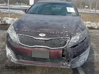 2014 Kia Optima LX with VIN 5XXGM4A71EG289837, listed as a IAAI auction lot 41418069 with 97,662 mi miles. Bid and sale history available at carsss.com. Image 6.