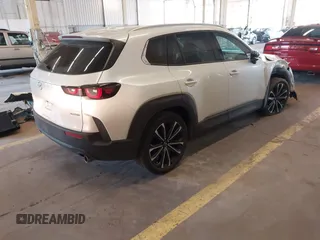 2023 Mazda CX-50 S Premium Plus z VIN 7MMVABEM5PN137829, wystawiony jako IAAI lot #42100783 z przebiegiem 22 209 mil mil oraz . Historia ofert i sprzedaży dostępna na DreamBid. Obrazek 4.