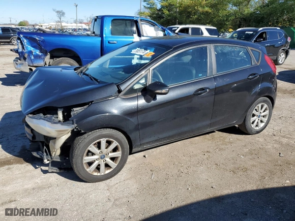 2013 Ford Fiesta SE with VIN 3FADP4EJXDM202150, listed as a Copart auction lot 79851174 with 127,979 mi miles and Salvage Title. Bid and sale history available at carsss.com. Image 1.