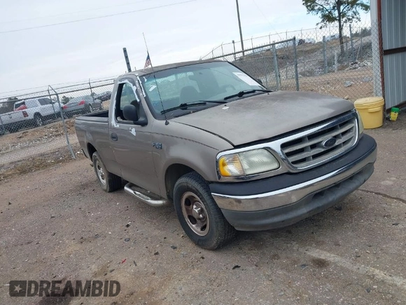 2002 Ford F-150 XL with VIN 3FTRF17212MA23970, listed as a IAAI auction lot 40991449 with 216,487 mi miles. Bid and sale history available at carsss.com. Image 1.