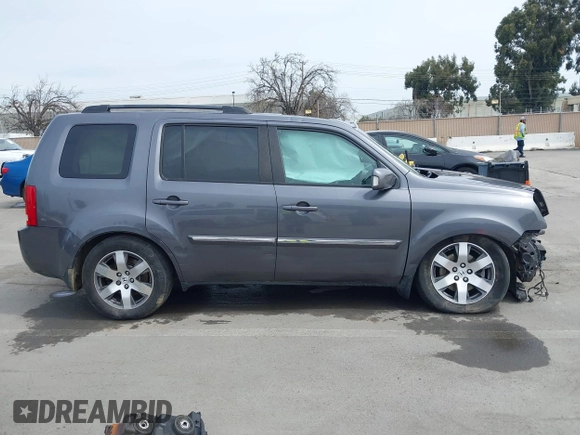 2015 Honda Pilot Touring with VIN 5FNYF3H91FB011847, listed as a IAAI auction lot 41841293 with 99,431 mi miles. Bid and sale history available at carsss.com. Image 14.