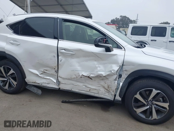 2020 Lexus NX 300 with VIN JTJGARBZ2L2160592, listed as a IAAI auction lot 42439214 with 44,617 mi miles and . Bid and sale history available at DreamBid. Image 17.