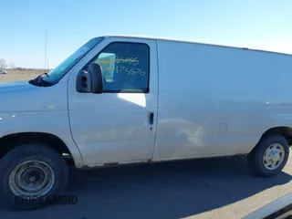 2012 Ford Econoline Cargo Commercial with VIN 1FTNE1EW7CDB34365, listed as a IAAI auction lot 41475570 with 278,883 mi miles and . Bid and sale history available at DreamBid. Image 14.