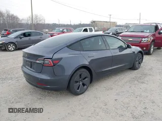 2023 Tesla Model 3 with VIN 5YJ3E1EA5PF474382, listed as a IAAI auction lot 41764268 with 31,040 mi miles and . Bid and sale history available at DreamBid. Image 4.