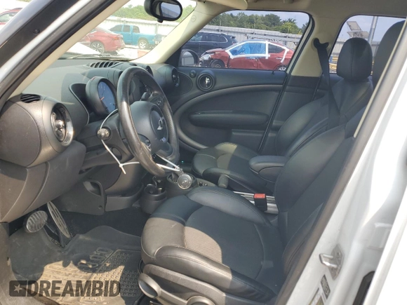 2015 MINI Countryman S with VIN WMWZC3C55FWT03267, listed as a Copart auction lot 59331605 with 116,964 mi miles and Salvage title. Bid and sale history available at DreamBid. Image 7.