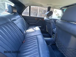 1988 Mercedes-Benz 560 with VIN WDBCA39D0JA421504, listed as a Copart auction lot 52342525 with 82,277 mi miles and Clean Title. Bid and sale history available at DreamBid. Image 6.