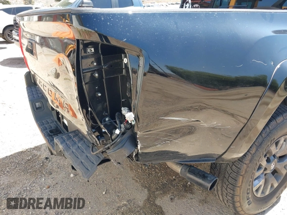 2023 Toyota Tacoma SR with VIN 3TMCZ5AN1PM654572, listed as a IAAI auction lot 42312575 with 14,111 mi miles and . Bid and sale history available at DreamBid. Image 17.