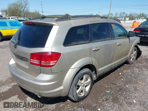 2009 Dodge Journey SXT with VIN 3D4GG57V69T232517, listed as a IAAI auction lot 42039587 with 346,783 mi miles. Bid and sale history available at carsss.com. Image 4.