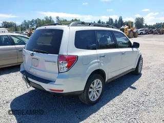 2012 Subaru Forester X Premium with VIN JF2SHADC2CH469660, listed as a IAAI auction lot 42639330 with 101,961 mi miles and . Bid and sale history available at DreamBid. Image 4.