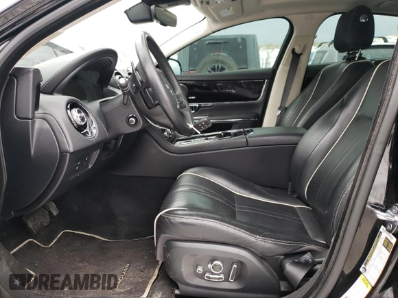 2019 Jaguar XJ with VIN SAJWJ1CD7K8W19566, listed as a Copart auction lot 43150345 with 29,020 mi miles and Salvage Title. Bid and sale history available at carsss.com. Image 7.