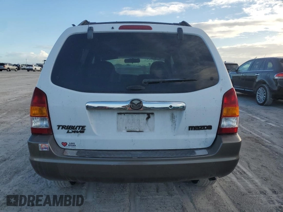 2002 Mazda Tribute LX with VIN 4F2YU09182KM09244, listed as a Copart auction lot 76758954 with Not Provided miles and Non Repairable. Bid and sale history available at carsss.com. Image 6.