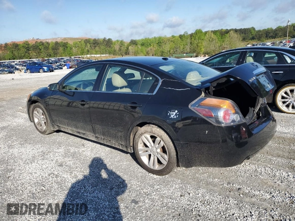 2012 Nissan Altima SR with VIN 1N4BL2APXCC243041, listed as a Copart auction lot 52371725 with 142,365 mi miles and Salvage Title. Bid and sale history available at DreamBid. Image 2.