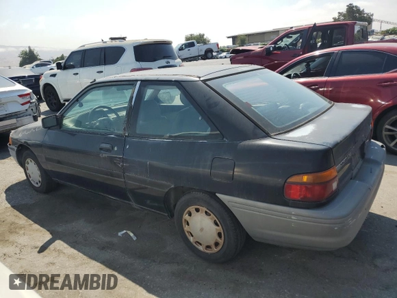 1992 Ford Escort z VIN 1FAPP11JXNW156984, wystawiony jako Copart lot #63462264 z przebiegiem 37 774 mil mil oraz Szkoda całkowita • Salvage title. Historia ofert i sprzedaży dostępna na DreamBid. Obrazek 2.