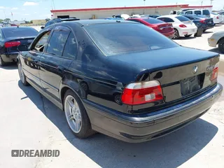 2001 BMW 5 Series 540i z VIN WBADN63401GM72502, wystawiony jako IAAI lot #42457683 z przebiegiem Nie podano mil oraz . Historia ofert i sprzedaży dostępna na DreamBid. Obrazek 3.