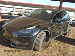 2023 Tesla Model Y Long Range with VIN 7SAYGDEE8PF815622, listed as a IAAI auction lot 41515433 with 70,862 mi miles and . Bid and sale history available at DreamBid. Image 6.
