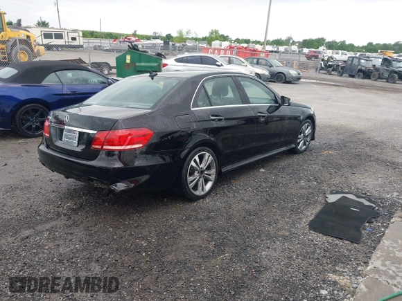 2014 Mercedes-Benz E 350 Sport with VIN WDDHF5KB8EA803966, listed as a IAAI auction lot 42109830 with 135,230 mi miles and . Bid and sale history available at DreamBid. Image 4.