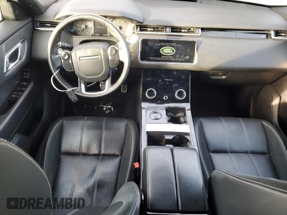 2020 Land Rover Range Rover Velar R-Dynamic S z VIN SALYK2FV2LA254327, wystawiony jako Copart lot #83226864 z przebiegiem 89 716 mil mil oraz Czysty tytuł • Clean title. Historia ofert i sprzedaży dostępna na DreamBid. Obrazek 8.