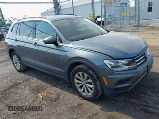 2018 Volkswagen Tiguan S with VIN 3VV0B7AX5JM108306, listed as a IAAI auction lot 42741783 with 71,040 mi miles and . Bid and sale history available at DreamBid. Image 1.