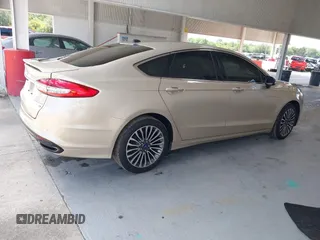 2018 Ford Fusion Titanium с VIN 3FA6P0D98JR268784, выставлен на аукционе IAAI как лот 42257897 с пробегом 145 446 миль миль и . История ставок и продаж доступна на DreamBid. Изображение 4.
