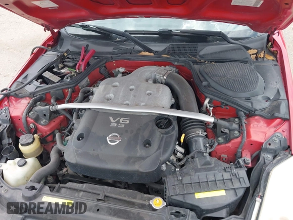 2005 Nissan 350Z Enthusiast z VIN JN1AZ34D15M608038, wystawiony jako IAAI lot #42312878 z przebiegiem 189 946 mil mil oraz . Historia ofert i sprzedaży dostępna na DreamBid. Obrazek 6.