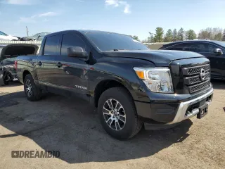 2024 Nissan Titan SV with VIN 1N6AA1EC2RN101063, listed as a Copart auction lot 49879235 with 12,418 mi miles and Salvage title. Bid and sale history available at DreamBid. Image 4.