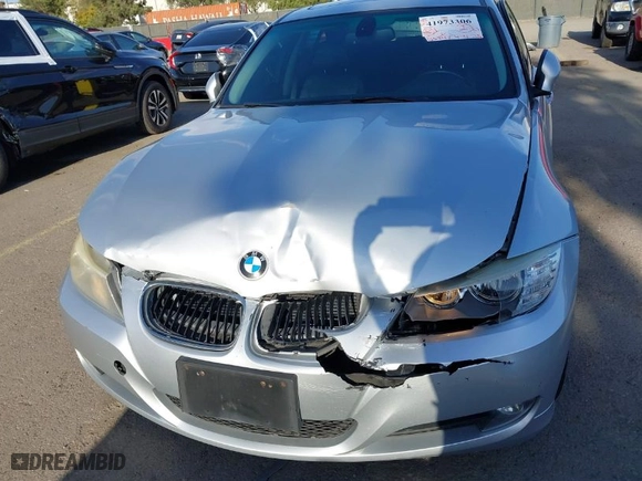 2011 BMW 3 Series 328i with VIN WBAPH7C5XBE682542, listed as a IAAI auction lot 41973306 with 135,947 mi miles. Bid and sale history available at carsss.com. Image 6.