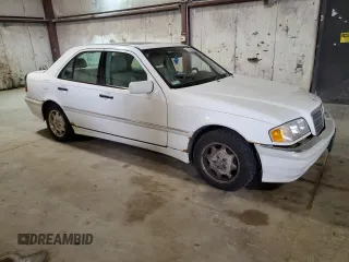 1999 Mercedes-Benz C 230/260/280/320 with VIN WDBHA24G5XA716110, listed as a Copart auction lot 51326555 with 107,190 mi miles and Salvage Title. Bid and sale history available at DreamBid. Image 4.