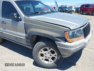 2000 Jeep Grand Cherokee Laredo with VIN 1J4GW48S8YC172274, listed as a IAAI auction lot 39738087 with 335,809 mi miles and . Bid and sale history available at DreamBid. Image 6.