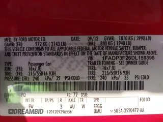2013 Ford Focus SE with VIN 1FADP3F26DL159395, listed as a IAAI auction lot 42026763 with 165,259 mi miles. Bid and sale history available at carsss.com. Image 9.