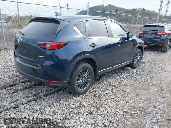 2019 Mazda CX-5 Touring with VIN JM3KFBCM5K0689948, listed as a IAAI auction lot 41976266 with 74,812 mi miles. Bid and sale history available at carsss.com. Image 4.