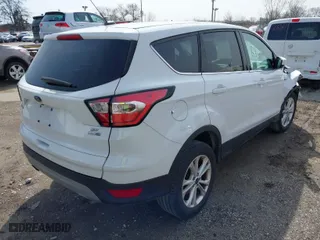 2017 Ford Escape SE with VIN 1FMCU9GD2HUE56001, listed as a IAAI auction lot 41818422 with 57,597 mi miles. Bid and sale history available at carsss.com. Image 4.