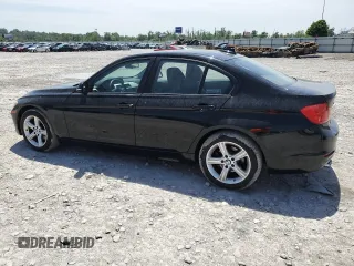2013 BMW 3 Series 328i xDrive with VIN WBA3B3C55DF541920, listed as a Copart auction lot 56963665 with 120,422 mi miles and Salvage title. Bid and sale history available at DreamBid. Image 2.
