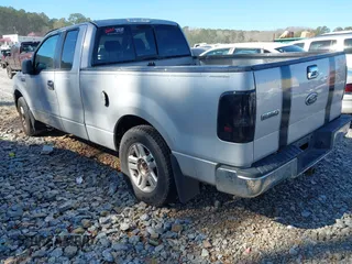 2005 Ford F-150 STX with VIN 1FTRX12W95NB42772, listed as a IAAI auction lot 41826733 with 224,266 mi miles. Bid and sale history available at carsss.com. Image 3.