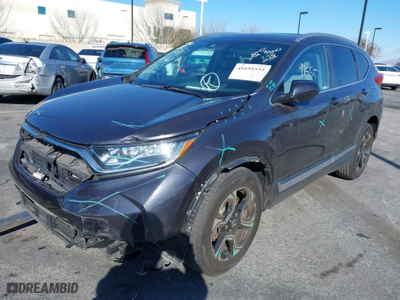 2019 Honda CR-V Touring with VIN 7FARW1H92KE014019, listed as a IAAI auction lot 41691555 with 32,635 mi miles. Bid and sale history available at carsss.com. Image 2.
