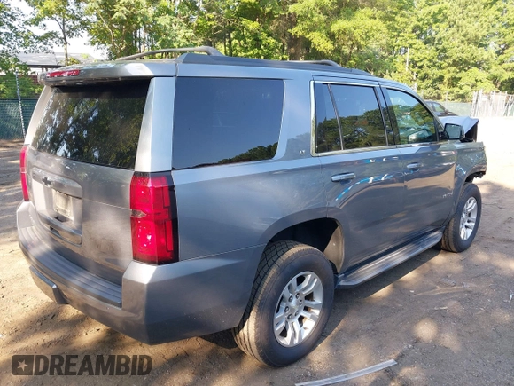 2018 Chevrolet Tahoe LT with VIN 1GNSKBKC7JR393246, listed as a IAAI auction lot 42544844 with 87,994 mi miles and . Bid and sale history available at DreamBid. Image 4.