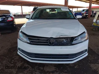 2017 Volkswagen Jetta SEL z VIN 3VWL17AJ3HM406760, wystawiony jako IAAI lot #42002426 z przebiegiem 152 890 mil mil oraz . Historia ofert i sprzedaży dostępna na DreamBid. Obrazek 12.