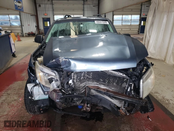 2010 Mercury Mariner z VIN 4M2CN9B70AKJ24170, wystawiony jako Copart lot #49241535 z przebiegiem 118 661 mil mil oraz Szkody całkowita. Historia ofert i sprzedaży dostępna na DreamBid. Obrazek 5.