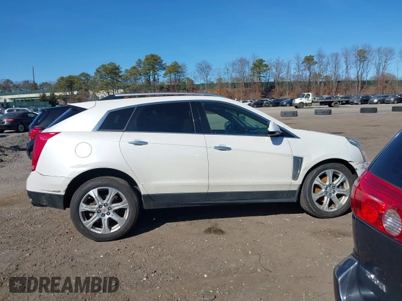 2015 Cadillac SRX Performance Collection with VIN 3GYFNFE35FS573814, listed as a IAAI auction lot 41770696 with 119,205 mi miles and . Bid and sale history available at DreamBid. Image 13.