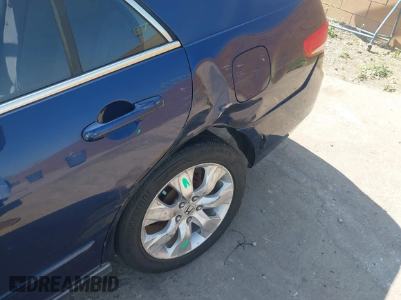 2003 Honda Accord LX with VIN JHMCM56353C063225, listed as a IAAI auction lot 42432611 with 202,916 mi miles and . Bid and sale history available at DreamBid. Image 12.