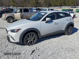 2018 Mazda CX-3 Touring with VIN JM1DKDC78J0325377, listed as a Copart auction lot 89141155 with 202,927 mi miles and Salvage Title. Bid and sale history available at carsss.com. Image 1.