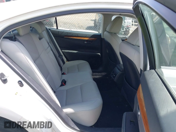 2014 Lexus ES 300h with VIN JTHBW1GG9E2068257, listed as a IAAI auction lot 42043095 with 130,560 mi miles and . Bid and sale history available at DreamBid. Image 8.