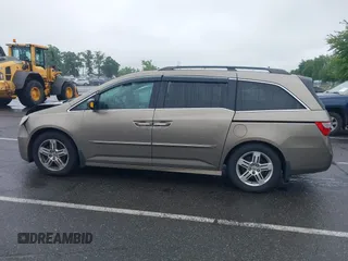 2012 Honda Odyssey Touring с VIN 5FNRL5H98CB060421, выставлен на аукционе IAAI как лот 42378822 с пробегом 249 128 миль миль и . История ставок и продаж доступна на DreamBid. Изображение 14.
