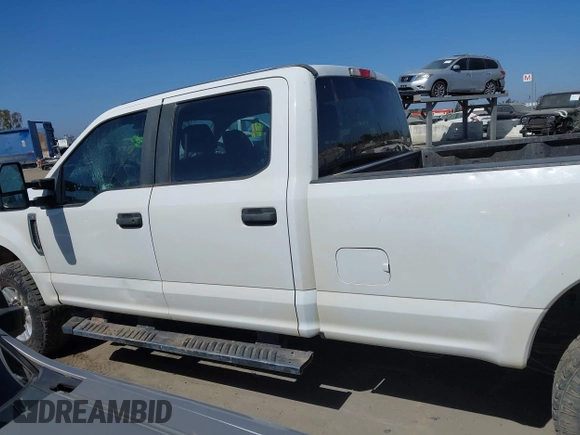 2018 Ford F-250 XL with VIN 1FT7W2B60JEB51984, listed as a IAAI auction lot 42282958 with 76,521 mi miles and . Bid and sale history available at DreamBid. Image 14.
