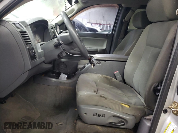 2006 Dodge Dakota SLT with VIN 1D7HW42NX6S711998, listed as a Copart auction lot 80129394 with 214,546 mi miles and Salvage Title. Bid and sale history available at carsss.com. Image 7.