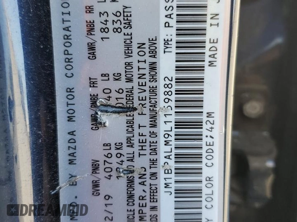 2020 Mazda 3 with VIN JM1BPALM9L1159882, listed as a Copart auction lot 61765925 with 59,494 mi miles and Salvage title. Bid and sale history available at DreamBid. Image 12.