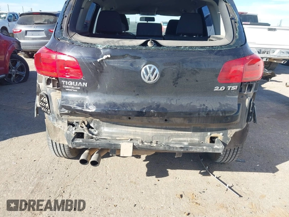 2013 Volkswagen Tiguan S z VIN WVGAV3AXXDW594680, wystawiony jako IAAI lot #41652323 z przebiegiem 136 382 mil mil oraz . Historia ofert i sprzedaży dostępna na DreamBid. Obrazek 6.