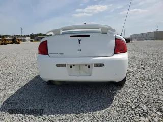 2009 Pontiac G5 z VIN 1G2AS18H097182905, wystawiony jako Copart lot #54411925 z przebiegiem 161 718 mil mil oraz Szkoda całkowita • Salvage title. Historia ofert i sprzedaży dostępna na DreamBid. Obrazek 6.
