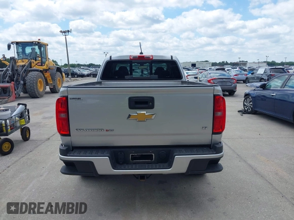 2018 Chevrolet Colorado 4WD LT with VIN 1GCHTCEN0J1230469, listed as a IAAI auction lot 42041284 with 130,228 mi miles and . Bid and sale history available at DreamBid. Image 16.